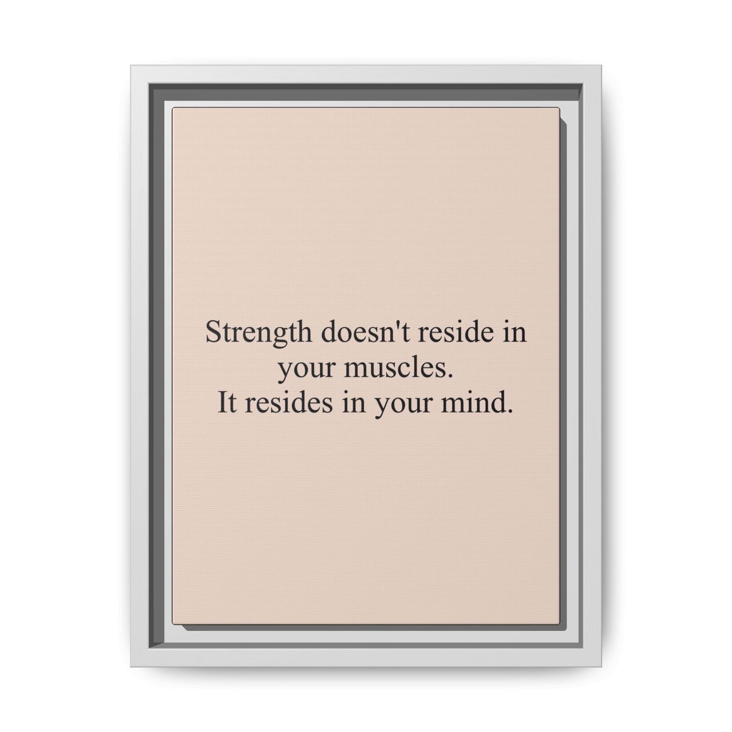 Framed Motivational Canvas — “Strength doesn't reside in your muscles. It resides in your mind.”