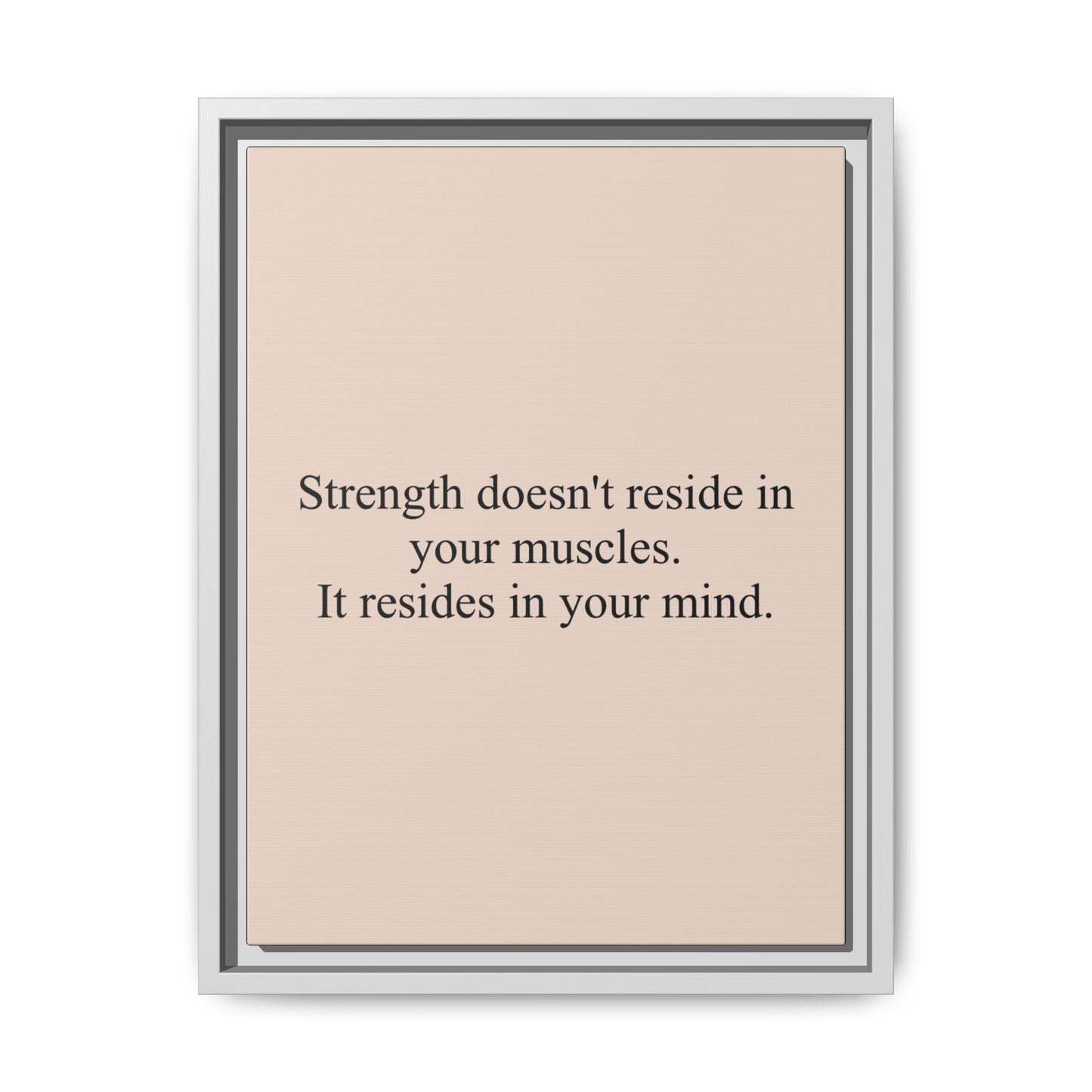 Framed Motivational Canvas — “Strength doesn't reside in your muscles. It resides in your mind.”