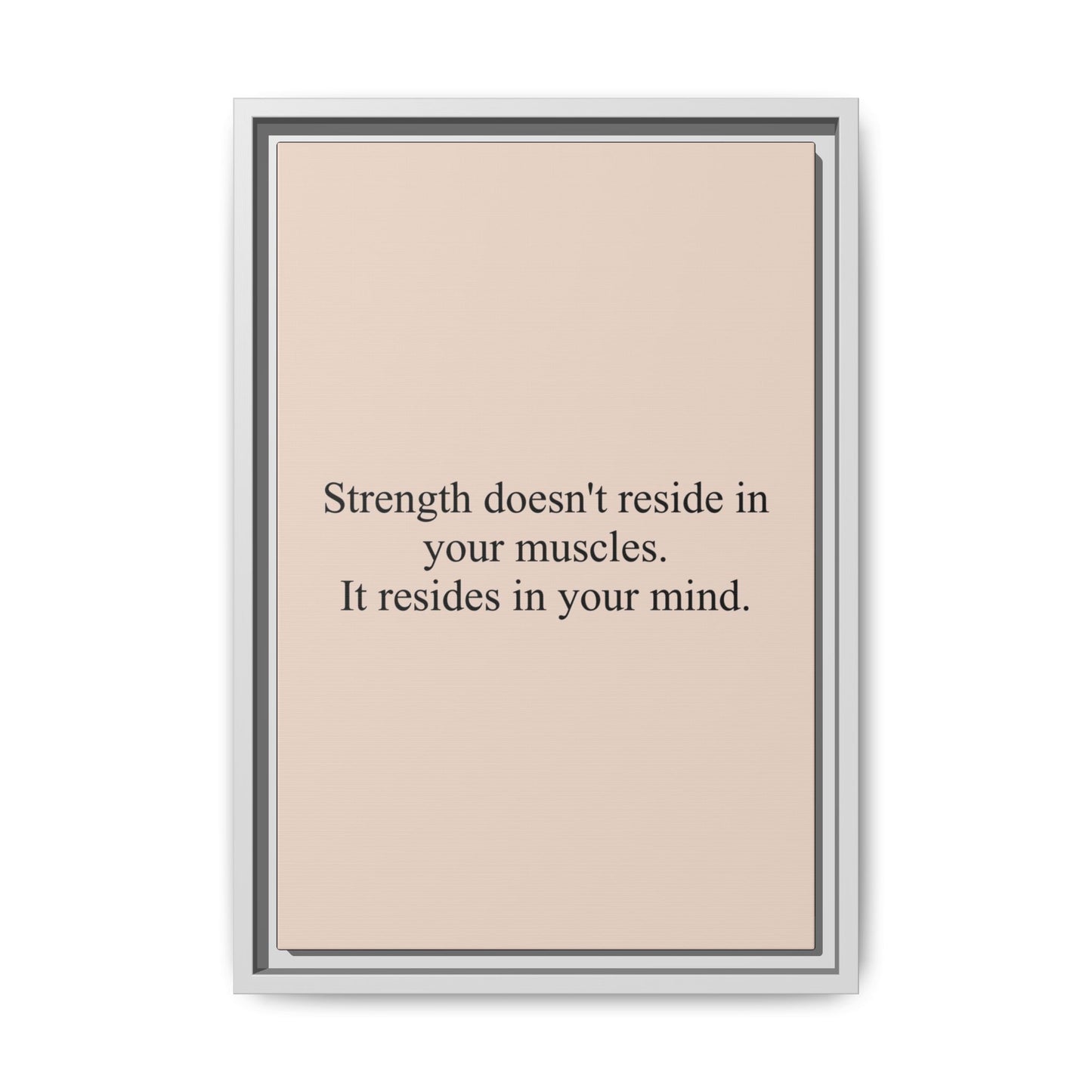 Framed Motivational Canvas — “Strength doesn't reside in your muscles. It resides in your mind.”