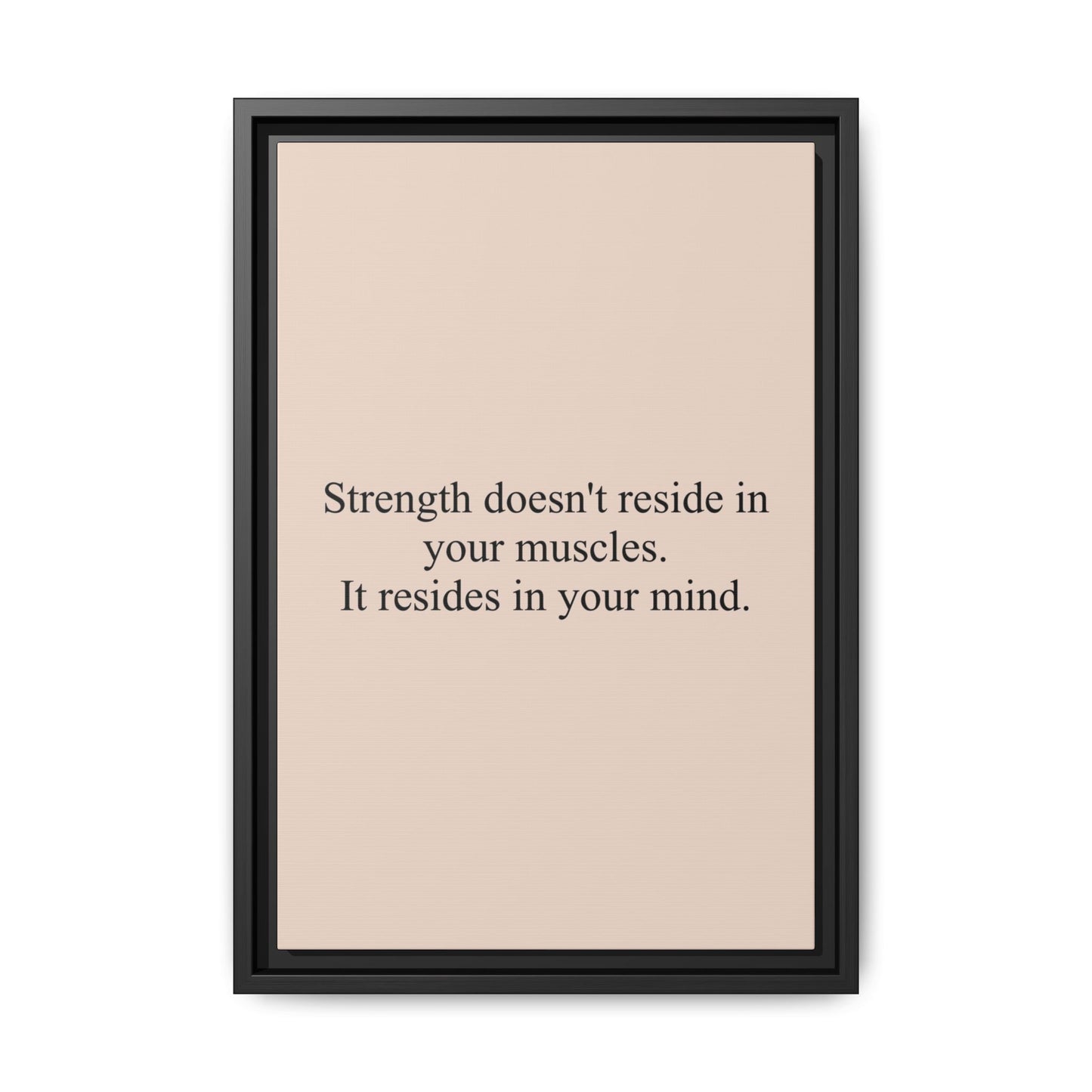 Framed Motivational Canvas — “Strength doesn't reside in your muscles. It resides in your mind.”