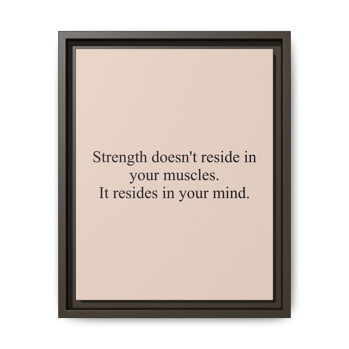 Framed Motivational Canvas — “Strength doesn't reside in your muscles. It resides in your mind.”