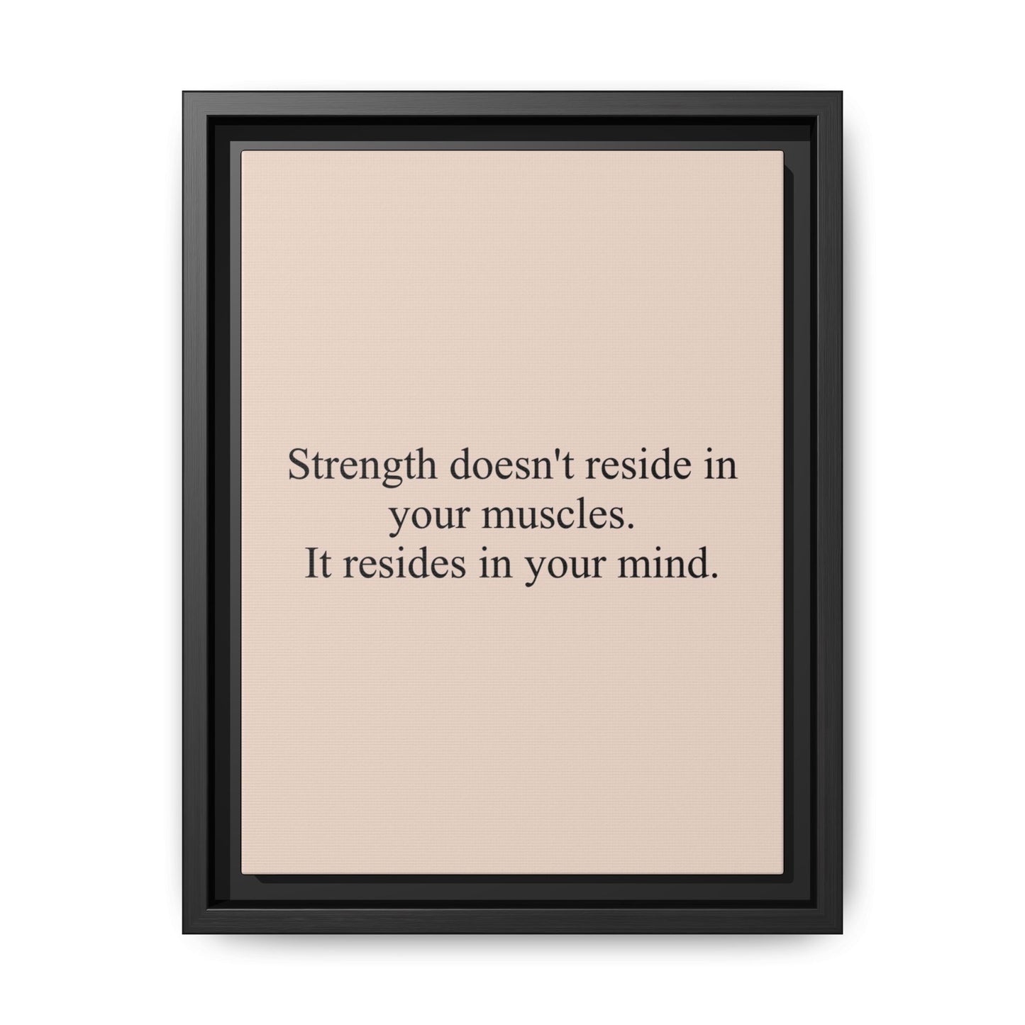 Framed Motivational Canvas — “Strength doesn't reside in your muscles. It resides in your mind.”