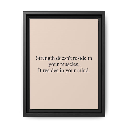 Framed Motivational Canvas — “Strength doesn't reside in your muscles. It resides in your mind.”
