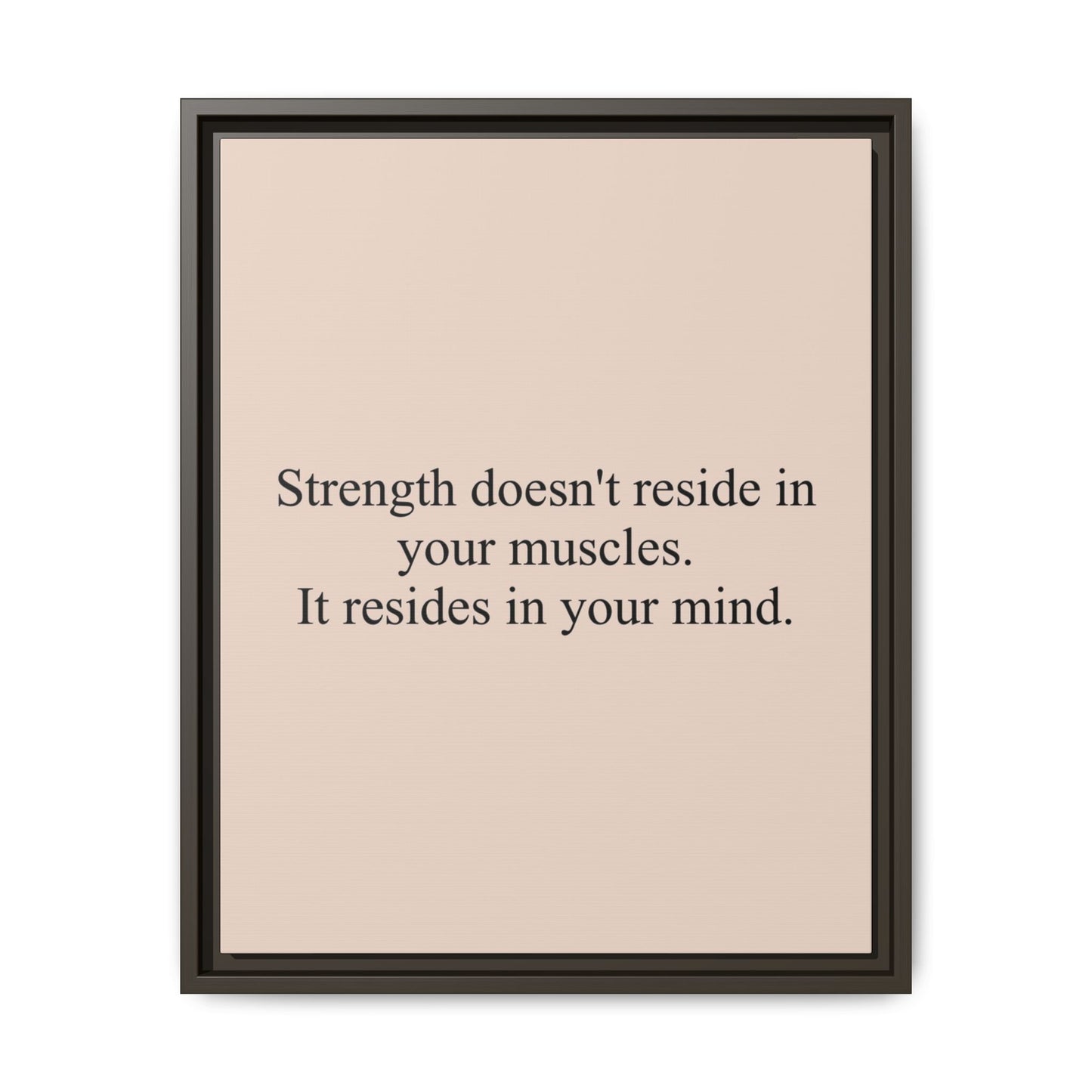 Framed Motivational Canvas — “Strength doesn't reside in your muscles. It resides in your mind.”