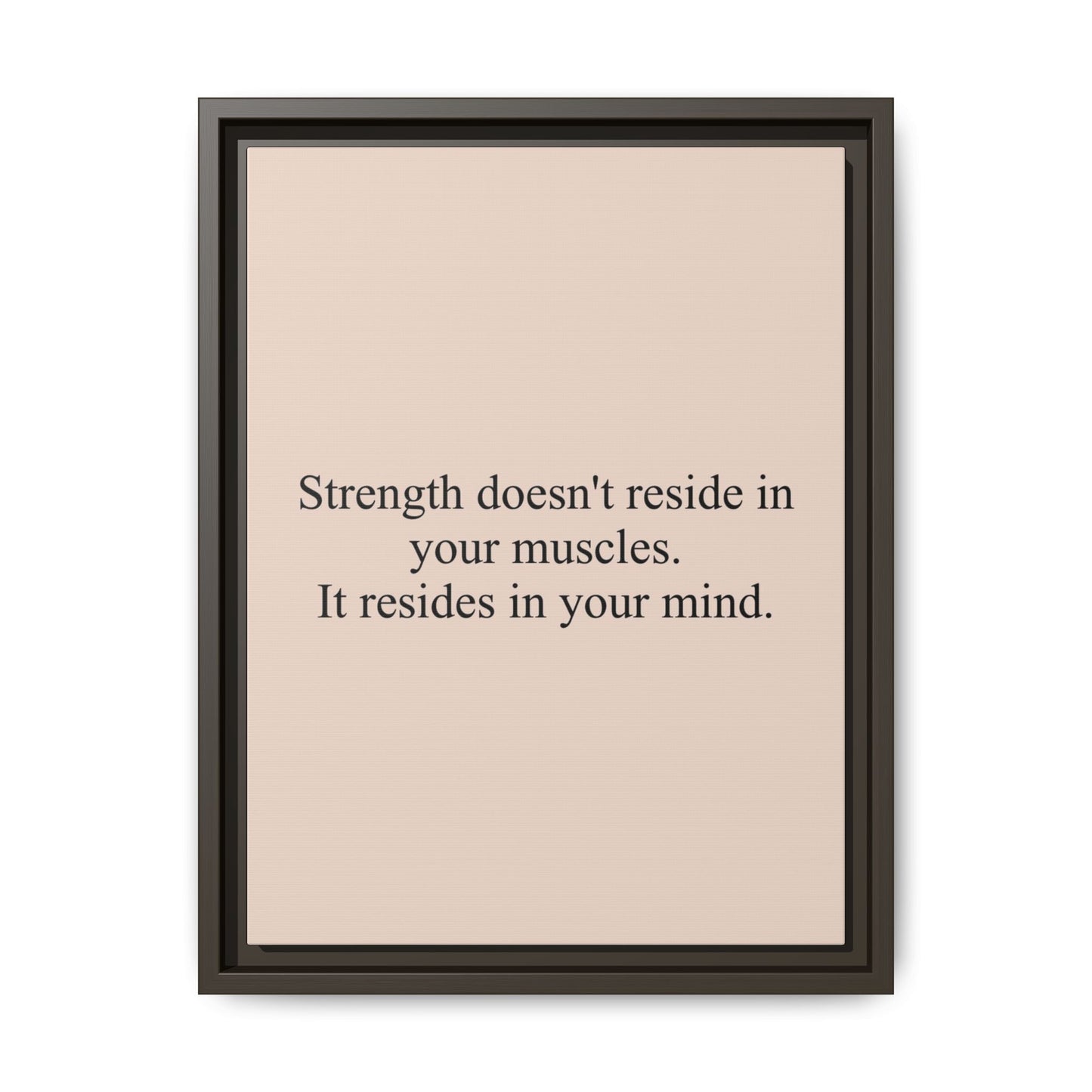 Framed Motivational Canvas — “Strength doesn't reside in your muscles. It resides in your mind.”